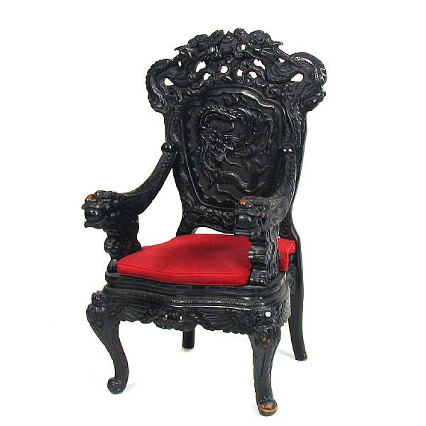 Appraisal: An imposing Chinese carved hardwood armchair height ft in width