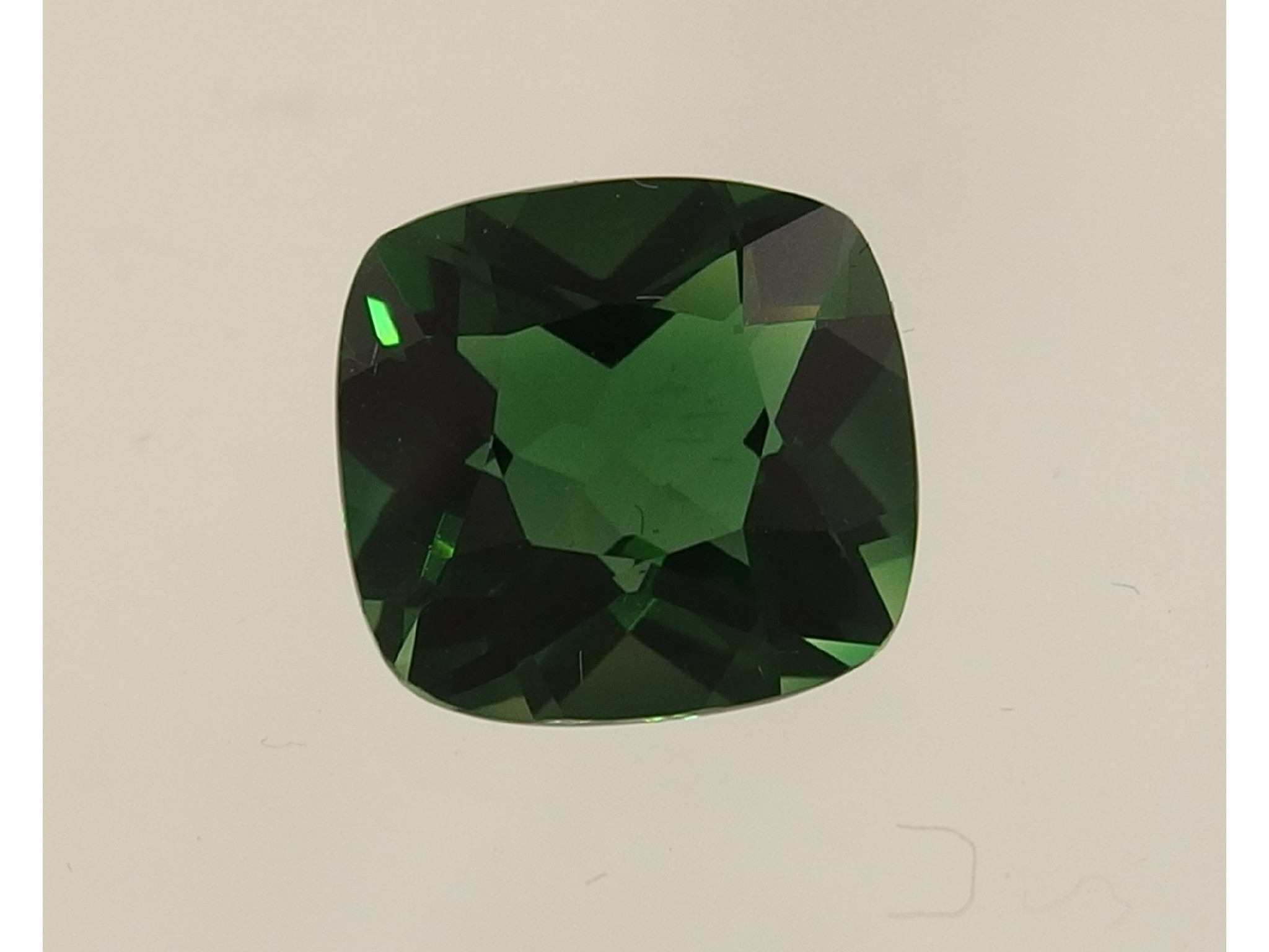 Appraisal: A cushion cut green tourmaline of approx cts