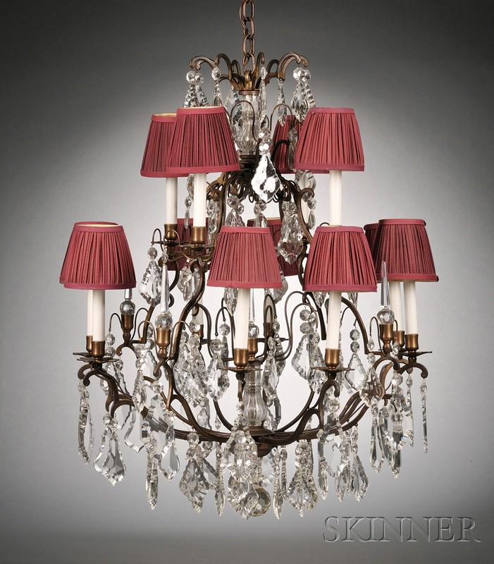 Appraisal: Louis XV Style Colorless Glass and Bronze Twelve-Light Chandelier th