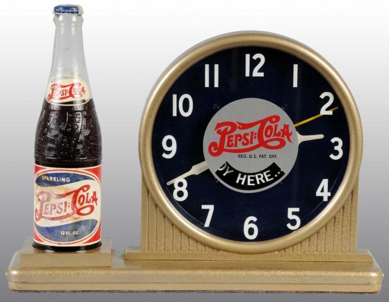 Appraisal: Electric Pepsi-Cola Clock with Bottle Description Circa s Working Condition