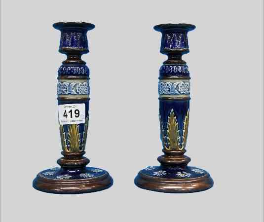 Appraisal: A Pair of Royal Doulton Lambeth Candlesticks one broken restuck