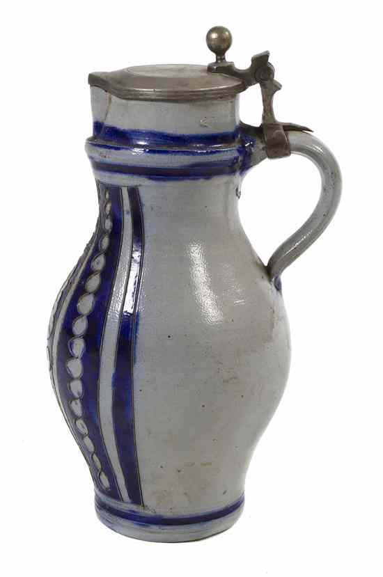 Appraisal: A German Salt Glaze Pitcher having pewter mounts and stylized