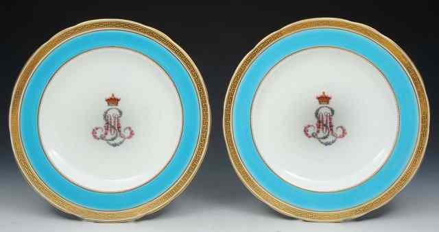 Appraisal: A PAIR OF MINTON CABINET PLATES painted with a monogram