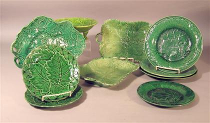 Appraisal: Group of green majolica tablewares Comprising a pair of two-handled