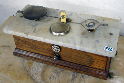 Appraisal: AN AMERICAN OAK CASED AND MARBLE BALANCE SCALES with silver