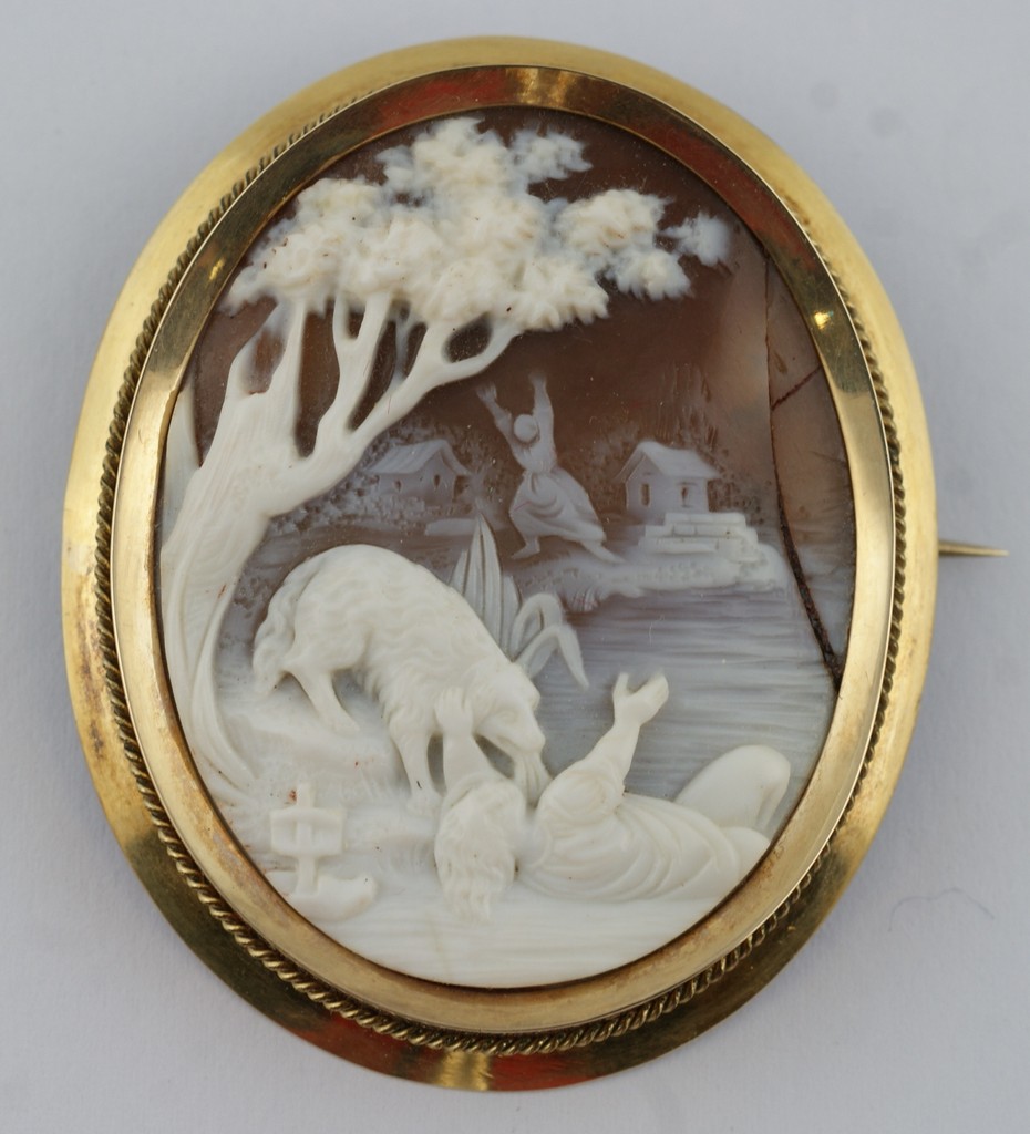 Appraisal: Carved shell cameo depicting a dog rescuing a girl at