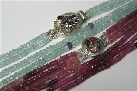 Appraisal: An aquamarine and amethyst bead two-row necklace composed of faceted