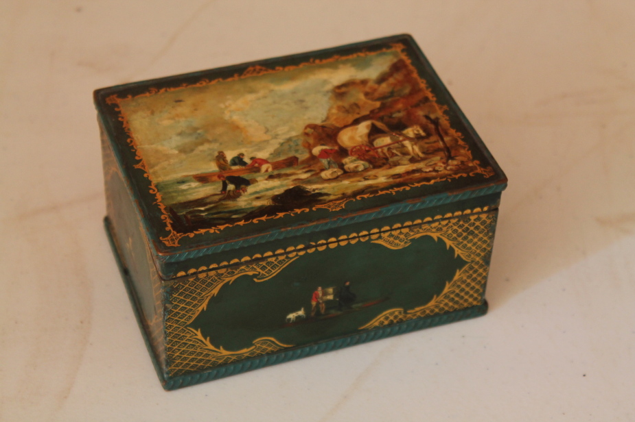 Appraisal: A plated and painted copper box decorated with a scene