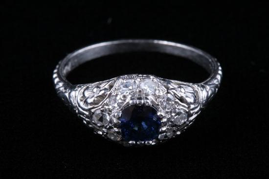 Appraisal: PLATINUM SAPPHIRE AND DIAMOND RING Circa Engraved pierced mounting centers