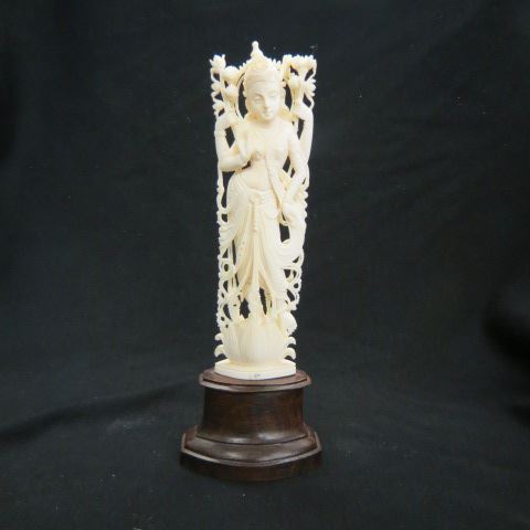 Appraisal: India Carved Ivory goddess elaborate detail plus wooden base excellent