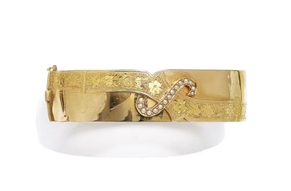 Appraisal: A PEARL AND GOLD BANGLE circa Pink gold Decorative bangle