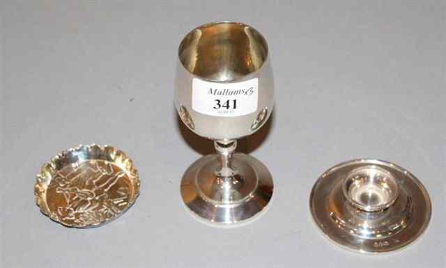 Appraisal: A SILVER CHALICE standing on a turned stepped foot high