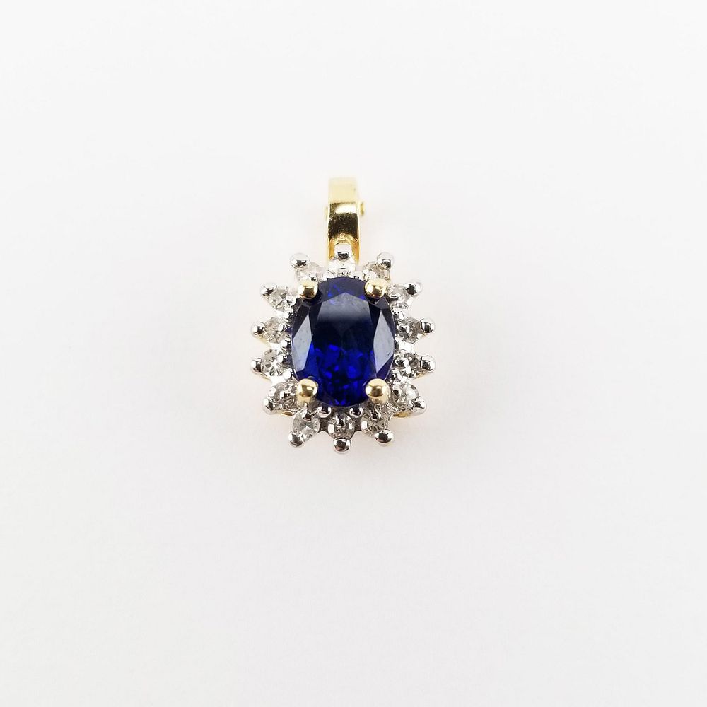 Appraisal: K Synthetic Sapphire Diamond Pendant K Synthetic Sapphire Diamond Pendant