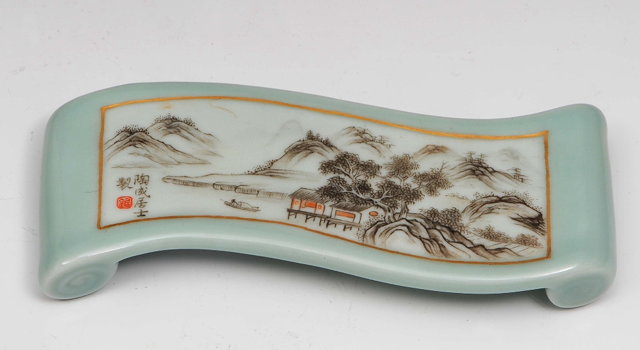 Appraisal: A Chinese porcelain celadon brush restRepublic periodin the form of