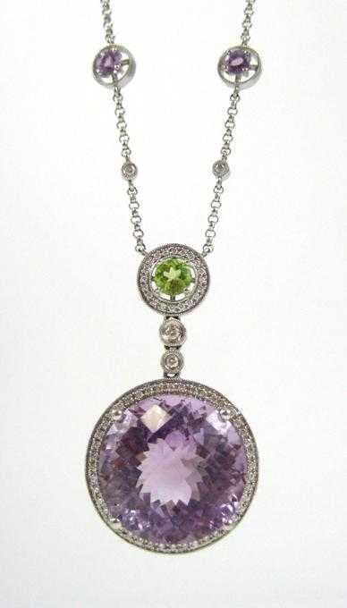 Appraisal: AMETHYST PERIDOT AND DIAMOND NECKLACE k white gold with two