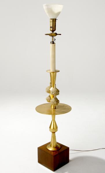 Appraisal: STYLE OF TOMMI PARZINGER Floor lamp with a gold leaf