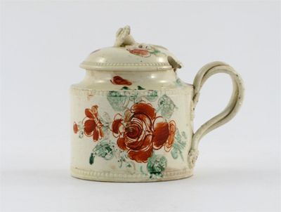 Appraisal: A creamware mustard pot and cover painted with red roses