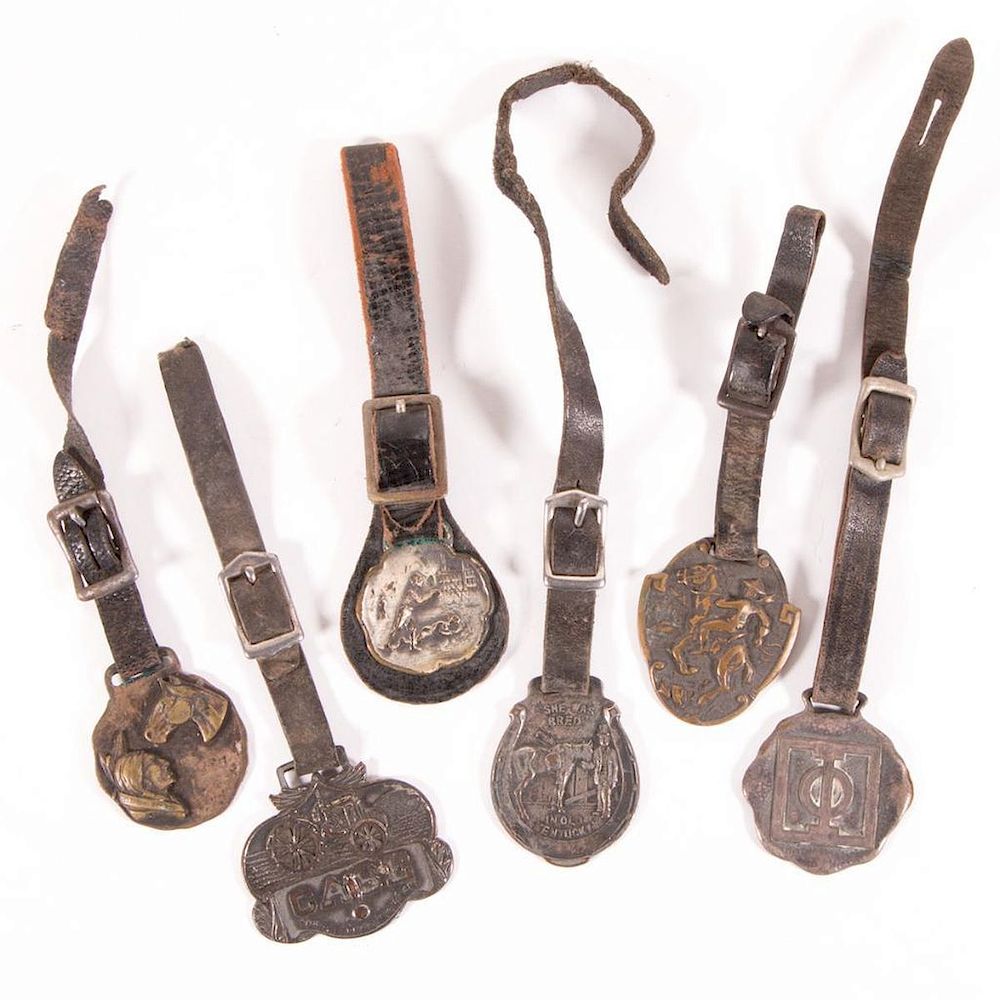 Appraisal: Six cast metal watch fobs Lot of six early th