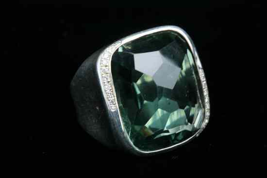 Appraisal: STERLING SILVER DIAMOND AND SEA GREEN TOURMALINE CONTEMPORARY DESIGN RING