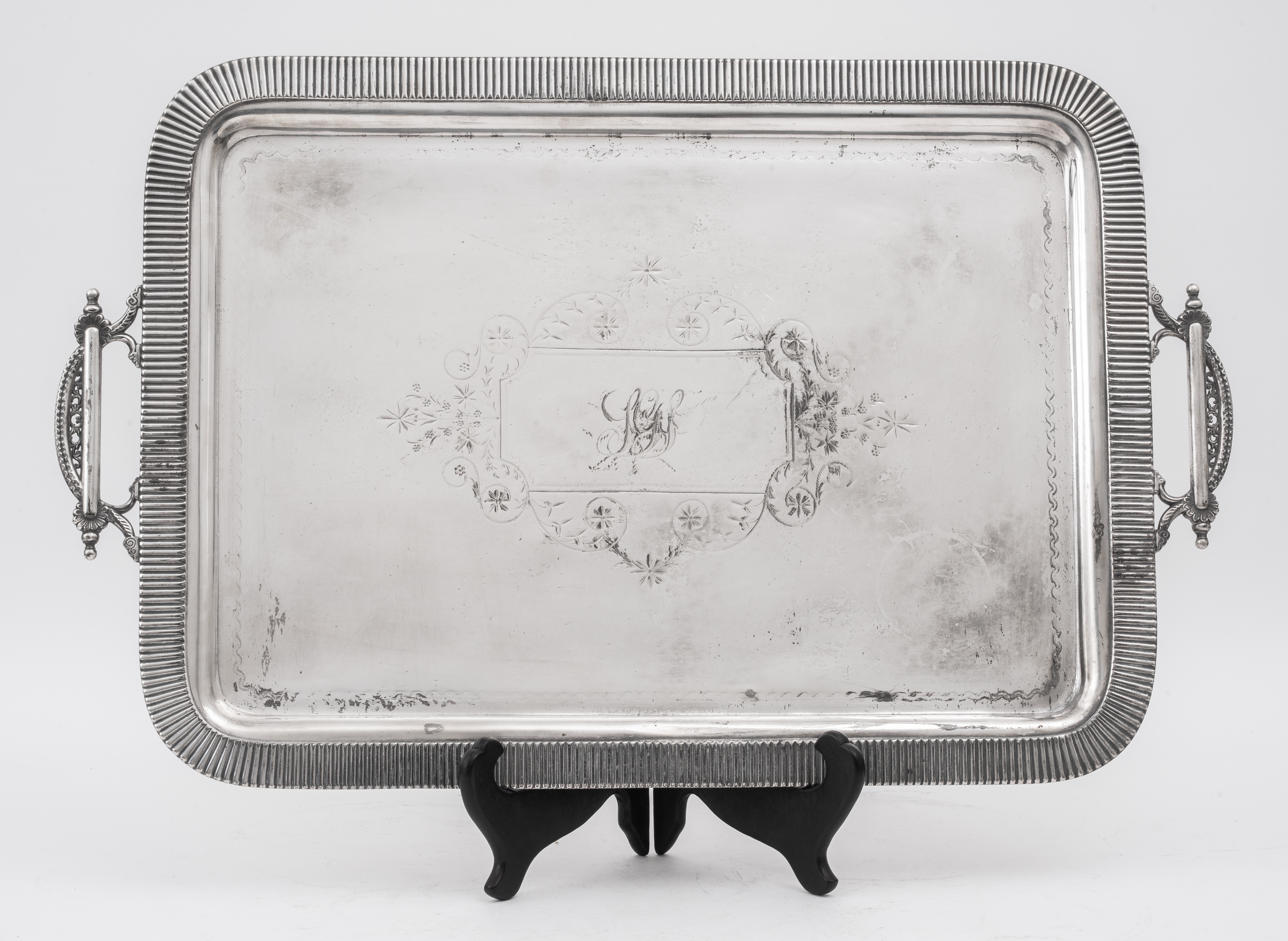 Appraisal: LARGE AESTHETIC MOVEMENT SILVER PLATE HANDLED TRAY A large Aesthetic