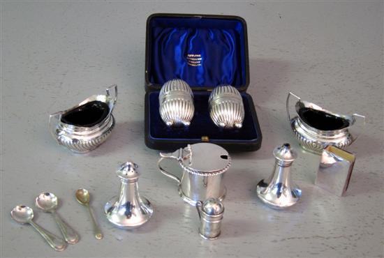 Appraisal: Pair of Edward VII silver pepper pots of oval form