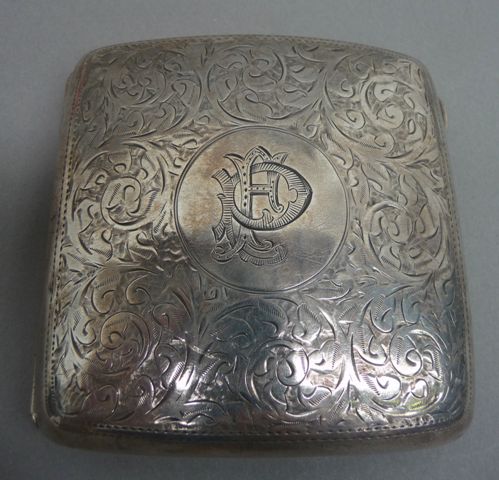 Appraisal: An Edwardian sterling silver cigarette case With chased scroll decoration