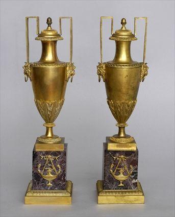 Appraisal: PAIR OF EMPIRE-STYLE GILT-BRONZE AND MARBLE MANTEL VASES Each slender