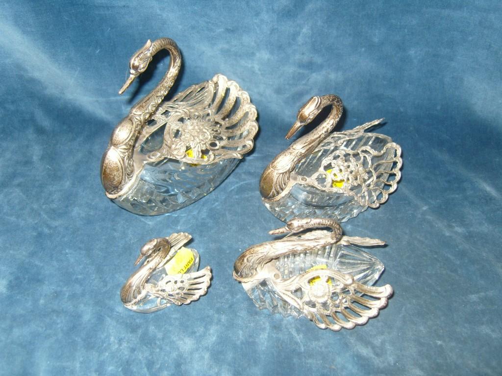 Appraisal: A collection of four glass salts with silver mounts in