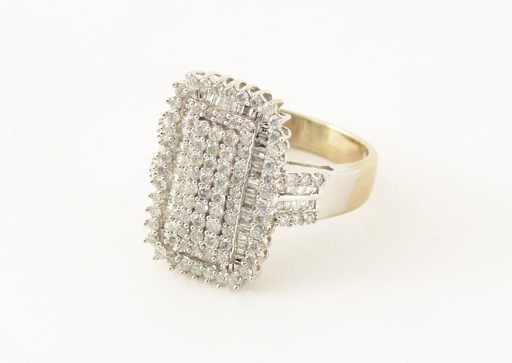 Appraisal: K WHITE GOLD PAVE DIAMOND COCKTAIL RING round brilliant cut