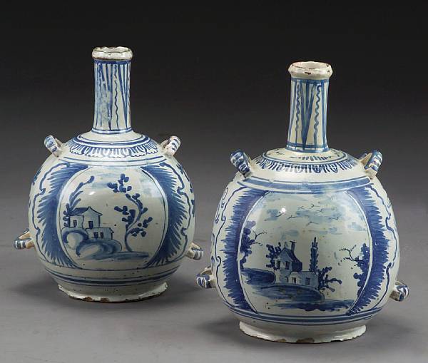 Appraisal: A pair of French faience blue and white gourd vases