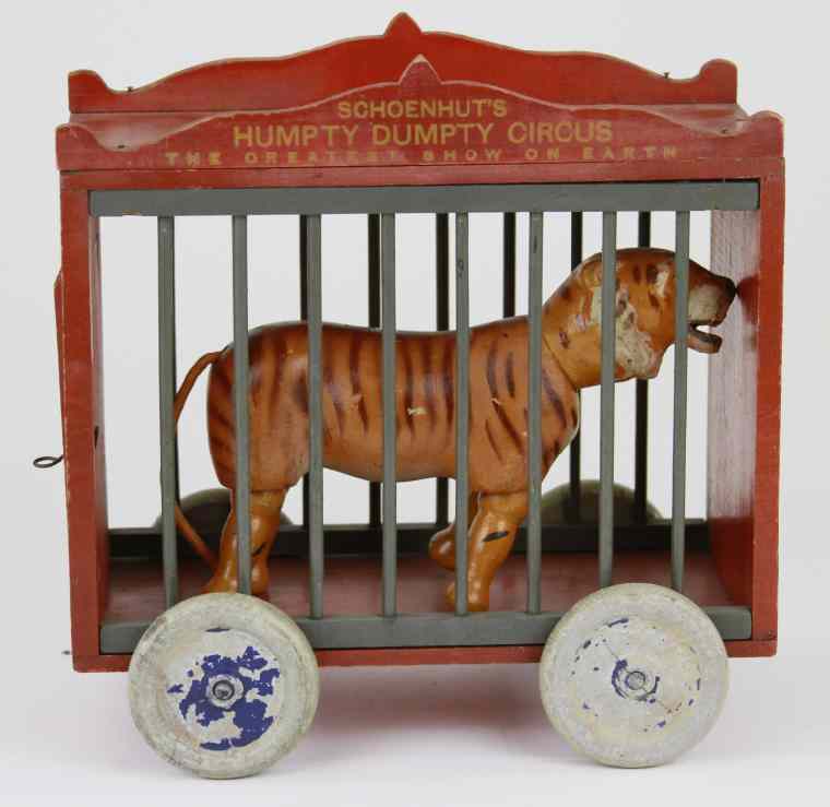 Appraisal: SCHOENHUT '' CAGE WAGON Wooden painted cage in red overall