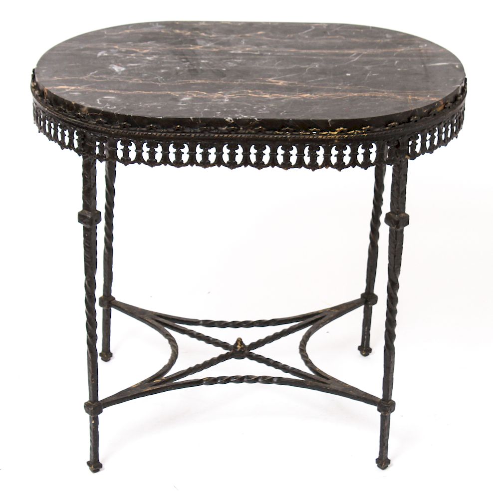 Appraisal: Oscar Bach Manner Cast Metal Oval Stand Marble Top Oscar