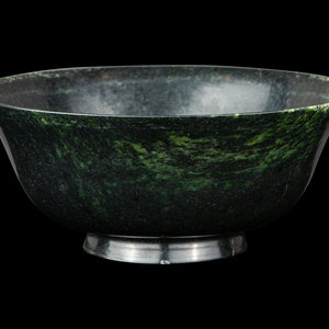 Appraisal: A Chinese Spinach Jade Bowl having deep rounded walls resting