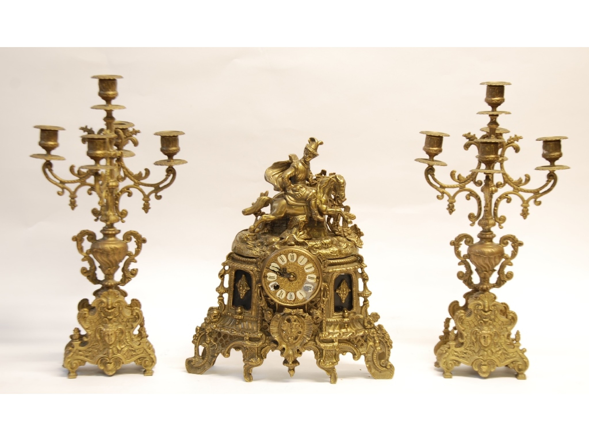 Appraisal: TH CENTURY CAST BRASS THREE PIECE CLOCK GARNITURE IN THE