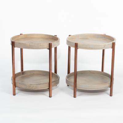 Appraisal: A pair of modern circular two-tier tables with dished surrounds