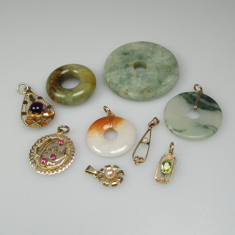 Appraisal: Various Gold Pendants set with diamonds amethyst jade peridot sapphires