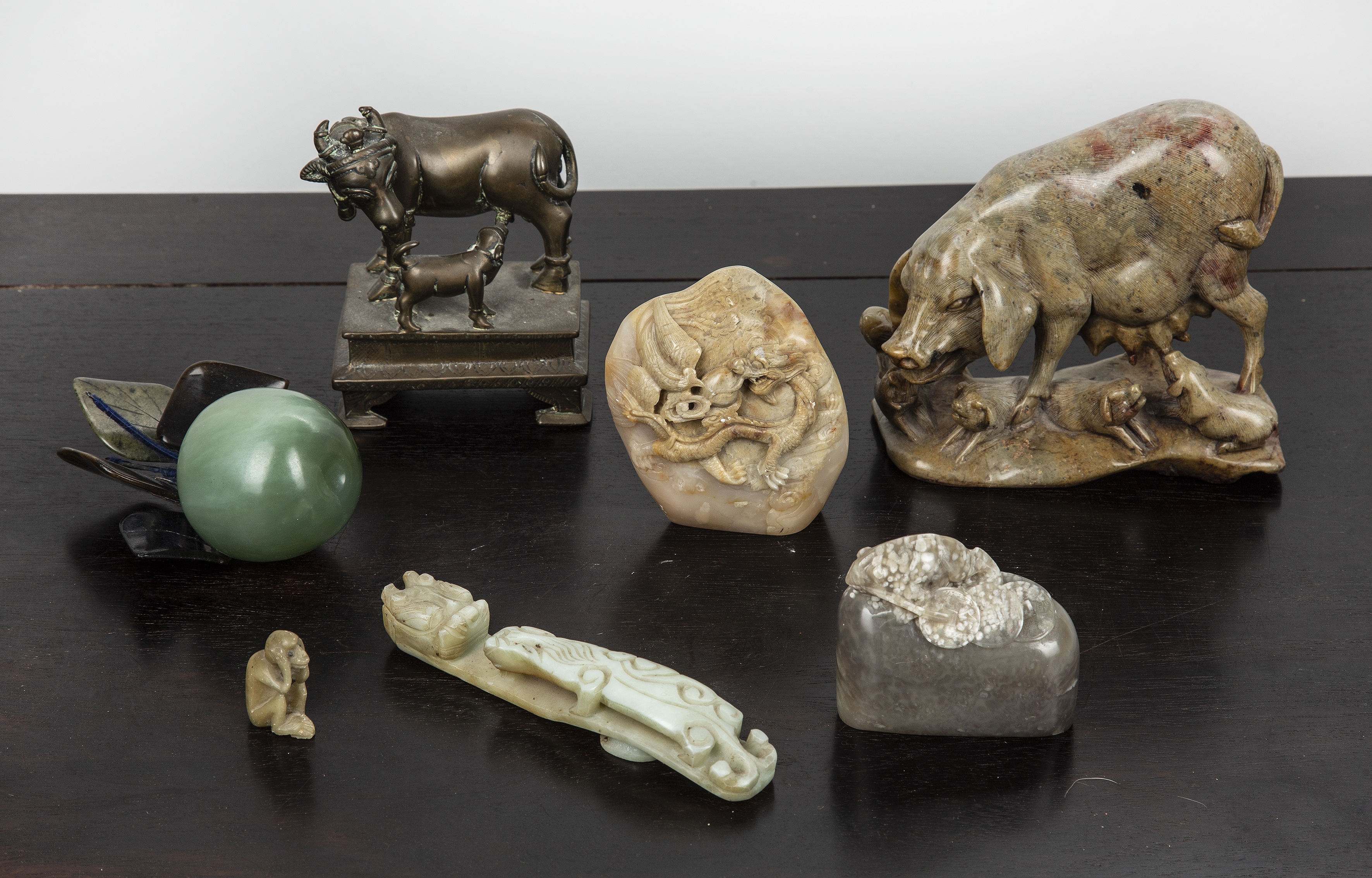 Appraisal: Group of hardstone carvingsChinese comprising of a sow and piglets