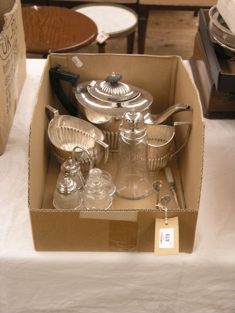 Appraisal: A Georgian style silver plated teaset half-reeded form teapot milk