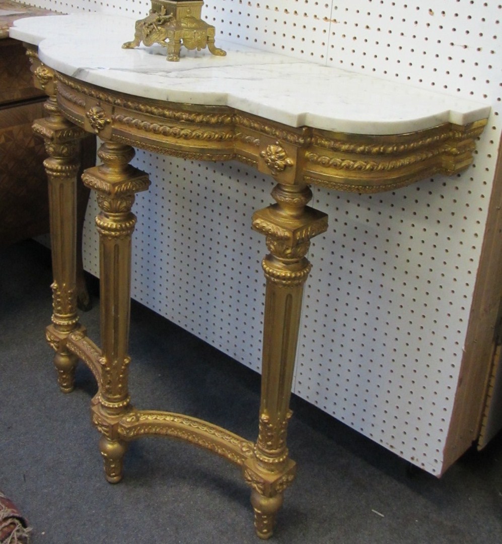 Appraisal: A pair of th century console tables each with shaped