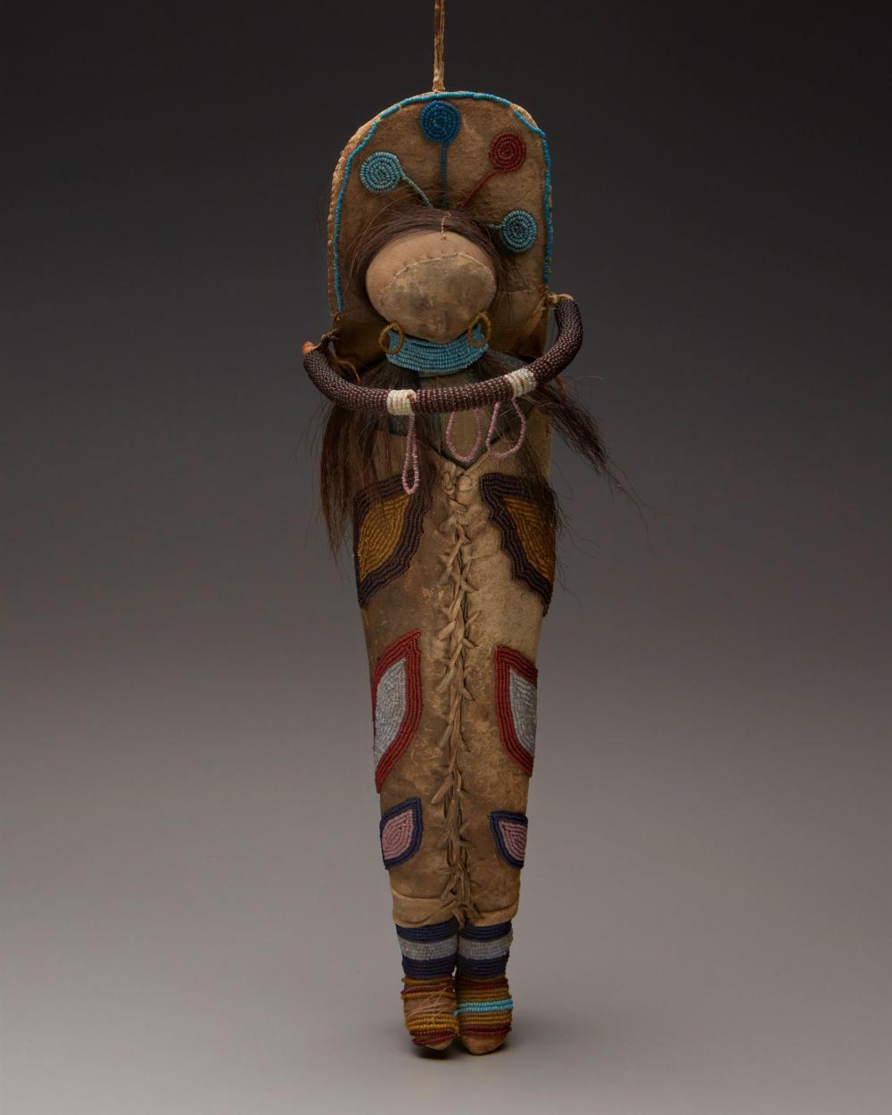 Appraisal: An Umatilla hide doll and cradleboard First-quarter th Century Northwest