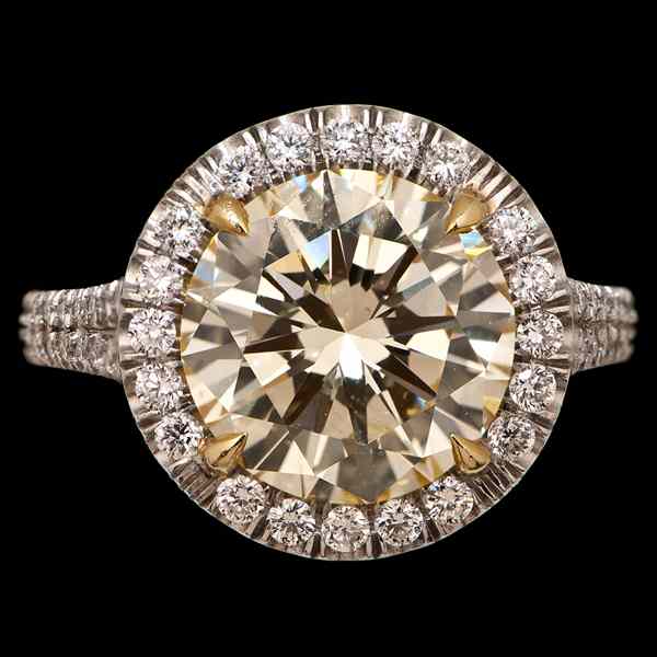 Appraisal: Platinum and Fancy Light Yellow Diamond Ring Platinum and diamond