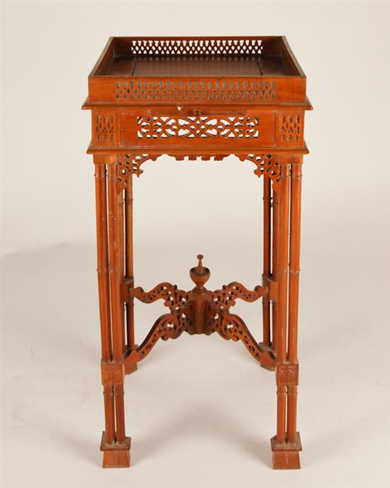 Appraisal: A Mahogany Chinese Chippendale-style Kettle Stand having a pierced gallery