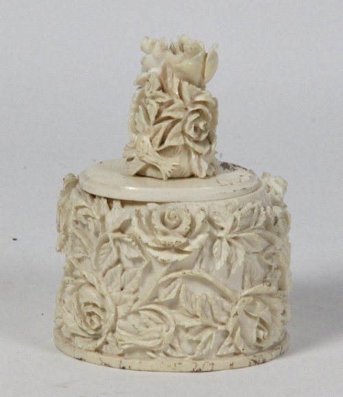 Appraisal: An ivory box and cover the finial and sides carved