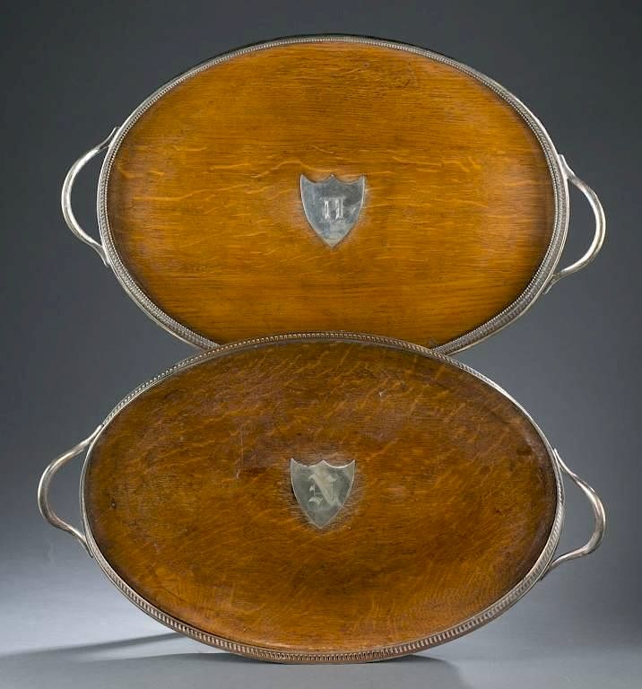 Appraisal: Pair of trays with shield monograms Pear wood base with