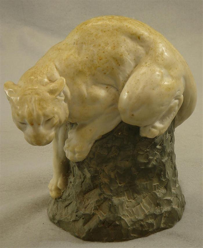 Appraisal: Carved painted alabaster sculpture of a mountain lion on a