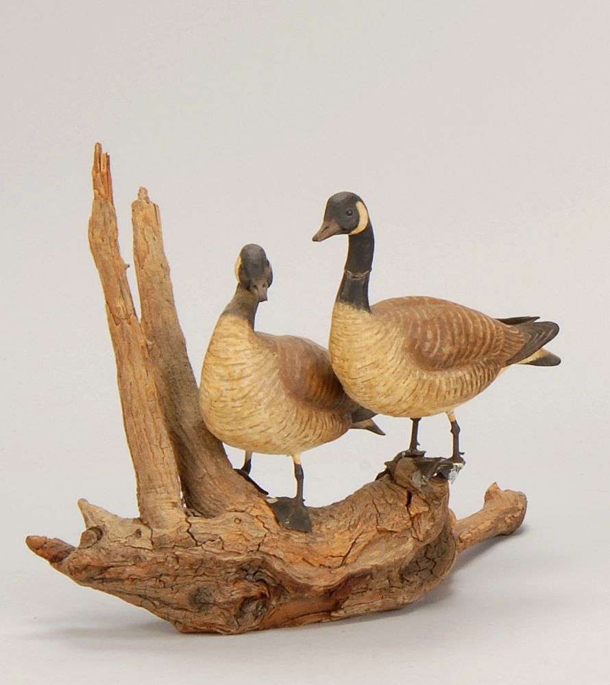 Appraisal: PAIR OF MINIATURE GEESE By Stan Sparre of Sandwich Massachusetts