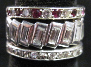 Appraisal: Three diamond band rings Two platinum and diamond one white