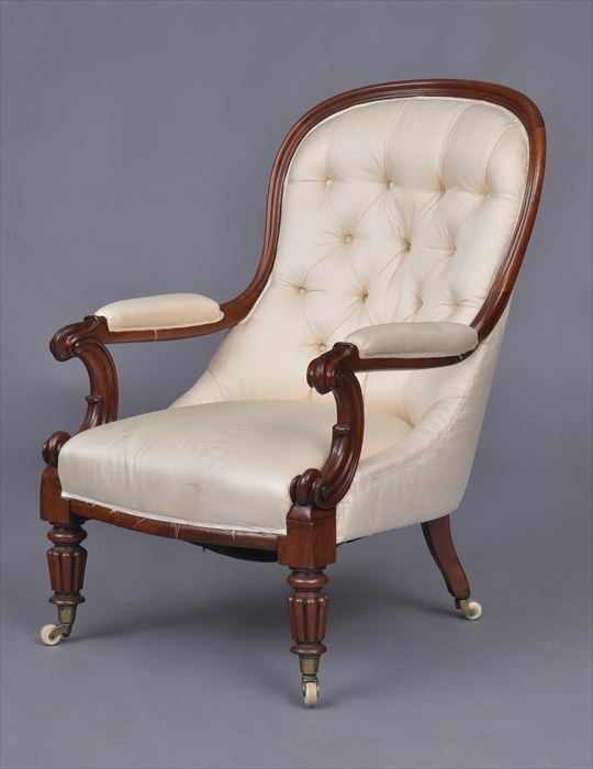 Appraisal: EARLY VICTORIAN CARVED MAHOGANY PARLOR ARMCHAIR With balloon-shape back the