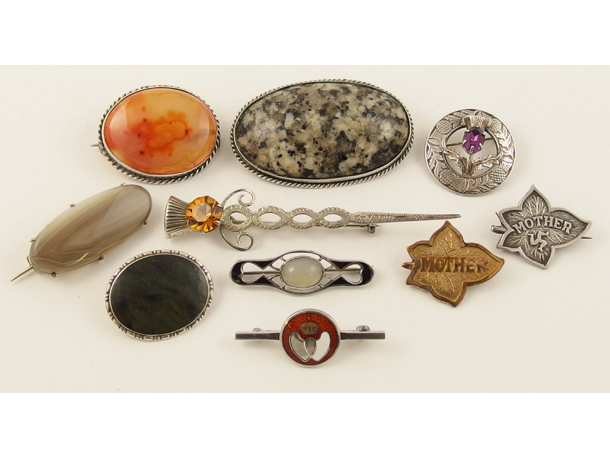 Appraisal: A collection of brooches to include Scottish agates a silver