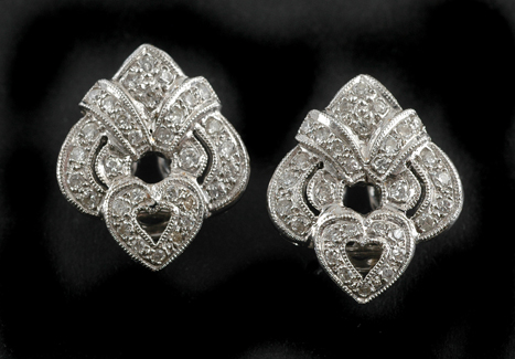 Appraisal: A pair of Art Deco style diamond earrings The ct